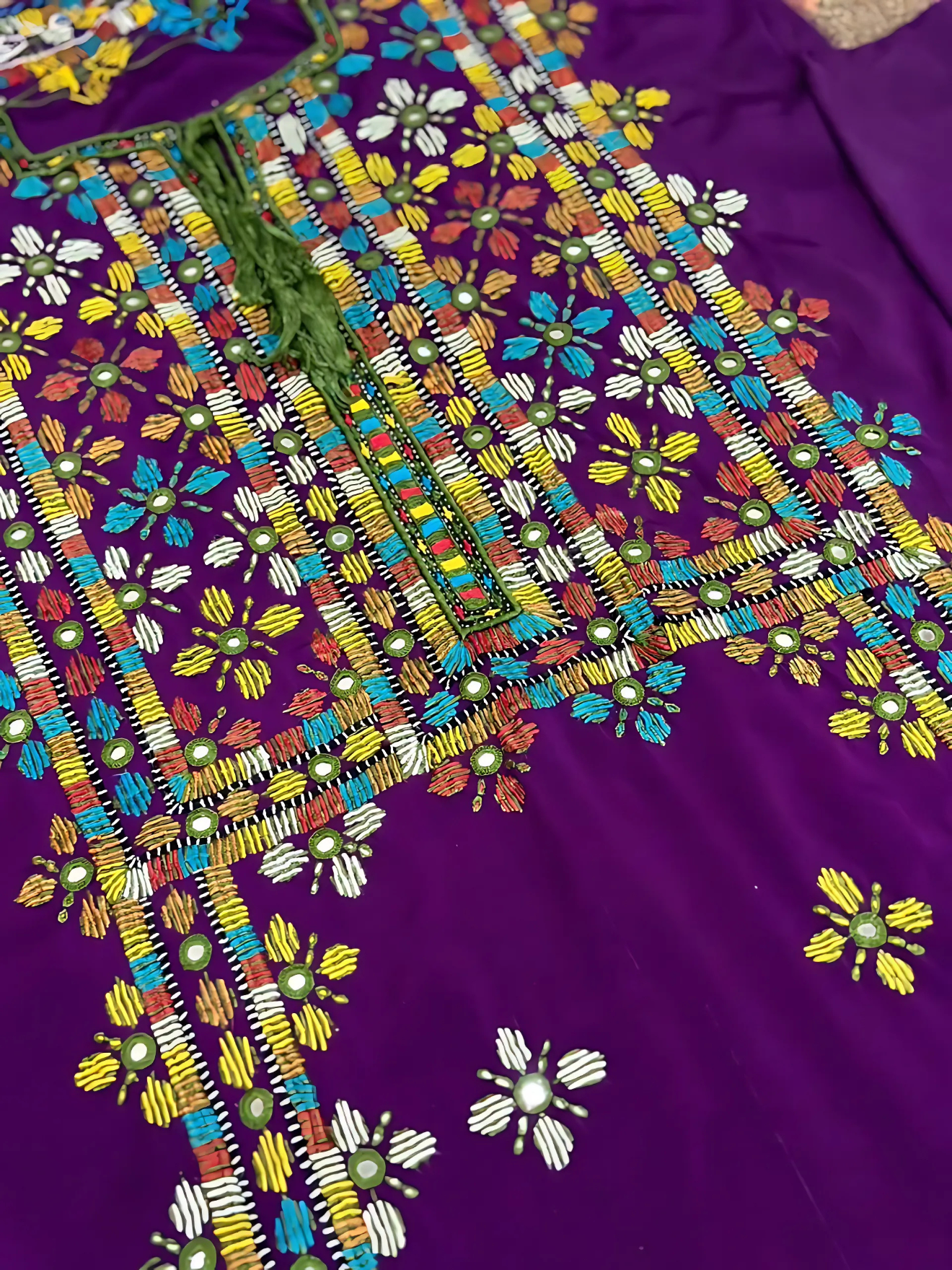 Traditional 2-piece Balochi embroidered suit in purple fabric with multicolor threadwork, handcrafted ethnic Pakistani wear for Eid and festive events.