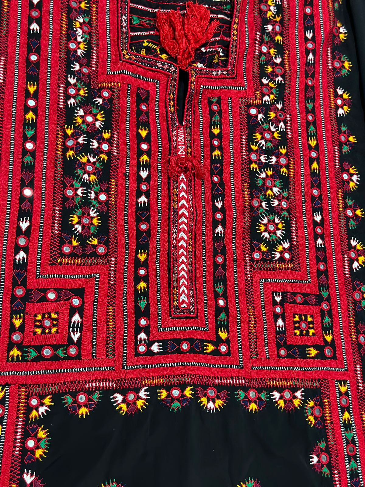 Handmade black Balochi kurta with red and multicolor traditional Pakistani embroidery